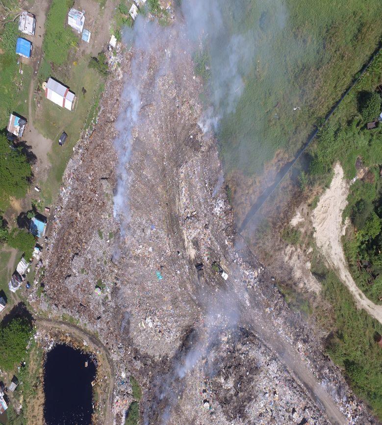 Smoke rising from smouldering waste